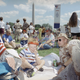 Marine Capt. John Knight, from Fort Wayne, Ind., stationed at Cherry Point, N.C., with the 2nd Marine Division, right, enjoys the picnic for the troops on the Ellipse in Washington on June 8, 1991, with his nephew, Steven Smith, 6, from Laurel, Md.